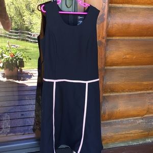 Black dress with pink cardigan sweater